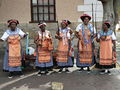 Xhosa women wearing Shweshwe fabric in South Africa
