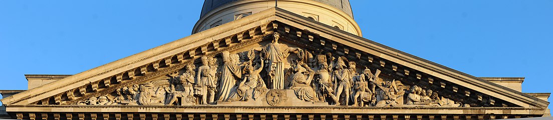 The pediment, with the central figures of the Nation and Liberty: statesmen and scholars to the left, soldiers to the right