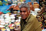 K19. A man selling handicrafts in Hyderabad, Andhra Pradesh.