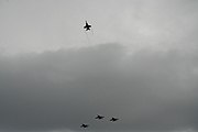 U.S. Navy aviators execute a missing man formation during the memorial flyover of the George Bush Presidential Library Center on December 6, 2018.