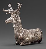 Vessel terminating in the forepart of a stag; c. 14th–13th century BC; silver with gold inlay; height: 18 cm; Metropolitan Museum of Art (New York City)