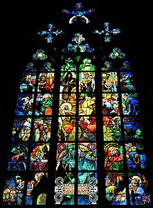 The stained glass window of St. Vitus Cathedral by Alphonse Mucha in Prague