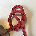 Starting with a slip knot with the slip end at top right.