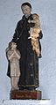 The Statue of Saint Vincent de Paul and two children[16]