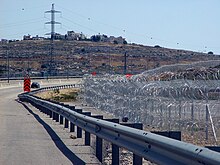 The barbed wire of the Israeli West Bank barrier (Giv'at Ze'ev, May 2010)