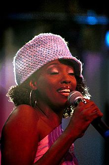 Conya Doss performing at the Rock and Roll Hall of Fame in Cleveland, Ohio, in February 2003