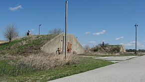 the front façade of a concrete bunker