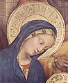 Pseudo-Arabic script in the Virgin Mary's halo, detail of Adoration of the Magi (1423) by Gentile da Fabriano. The script is further divided by rosettes like those on Mamluk dishes.[20]