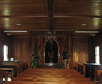 Restored koa woodwork in the interior of the Church