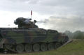 A German Army Marder fires its Rh202 20 mm cannon on a training exercise.