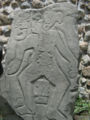 One of the stelae known as Dancing by unorthodox positions of the characters represented.