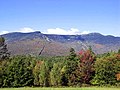 Image 24Mount Mansfield, at 4,393 feet (1,339 m), is the highest-elevation point in Vermont. Other high points are Killington Peak, Mount Ellen, Mount Abraham, and Camel's Hump. The lowest point in the state is Lake Champlain at 95 feet (29 m). The state's average elevation is 1,000 feet (300 m). (from History of Vermont)
