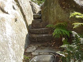 Stairs of rock placed in a natural passage