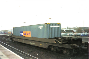 A Tiphook rail intermodal freight well car at Banbury station in the UK in 2001