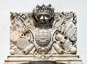 Trophy with the coat of arms of the United Kingdom of Portugal, Brazil and the Algarves in the façade of the Castle of Estremoz