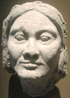 Plaster face of an older Amarna-era woman, (possibly Tiye, the mother of pharaoh Akhenaten), from late in Akhenaten's reign, years 14–17, from the workshop of the sculptor Thutmose, on display at the Ägyptisches Museum