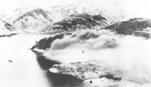 Japanese transport ship burning off Kiska, Alaska after U.S. attack on 18 June 1942