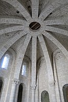 Moissac, Turmkuppel, 4. V. 11. Jh.; was auf den ersten Blick als Bandrippen einer Kuppel erscheint, sind die als Viertelkreis-Kehlen verlaufenden Unterkanten von Scheiben, die die aus Tonnensegmenten mit waagerechten Scheiteln bestehende Decke tragen.