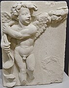 Putto which was part of the "two-faced door" of the former townhouse chapel.