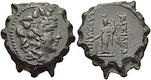 Coin of Alexander II. On the obverse, the bust of the god Dionysus surrounded by ivy leaves is shown. On the reverse the statue of a standing winged Tyche is depicted