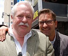 Maupin (left) with husband Christopher Turner in 2013