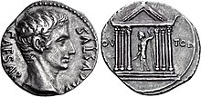 Photograph of a Roman coin: a man's head, facing right, on the obverse, with a temple with a god's statue on the reverse.