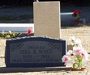 Graves of Erza Beeson Weed (1900–1968) (front) and his wife Elizabeth Weed (1903–1924). Erza was the son of the founders of Weedville Ora Rush Weed and Phoebe Pomeroy Weed.