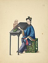 Woman playing a yunluo.