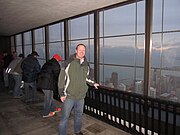 Tourists in the observation deck's screen-protected open-air SkyWalk area in 2013