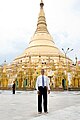 Image 10Former US President Barack Obama poses barefoot on the grounds of Shwedagon Pagoda, one of Myanmar's major Buddhist pilgrimage sites. (from Culture of Myanmar)