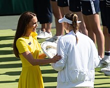 Catherine congratulating a tennis player