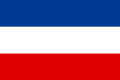 The flag of the Kingdom of Yugoslavia, a simple horizontal triband.