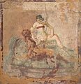 Sex between a female and a male.The figure on the left has a garland of rose petals around their head. The figure to the right is wearing a strophium which is a kind of bra or bikini top.[81] Pompeii. Around 70CE