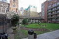 St Bartholomew the Great Priory Church's cloisters and Barts Hospital