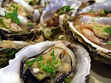 Oysters steamed in two ways: with ginger and garlic, and in black bean sauce