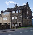 Image 33Former weavers' cottages in Wardle. An increase in domestic cloth production, and textile manufacture during the Industrial Revolution is attributed to a population boom in the area. (from Greater Manchester)