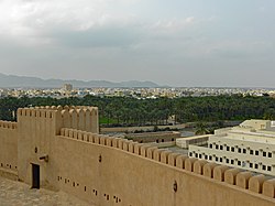 View of the city from Rustaq Fort, with the Western Hajar Mountains in the background