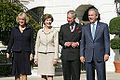 President George W. Bush and First Lady Laura Bush with Charles, Prince of Wales and Camilla, Duchess of Cornwall at the White House during the Waleses' official visit to the United States, 2005
