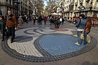 The mosaic Pla de l'Os by the artist on the Ramblas of Barcelona