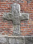 Romanesque cross on the north wall of St. Bartholomew's Church
