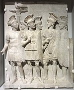 The Praetorians Relief from the Arch of Claudius showing the type of Attic helmet, with an upstanding browband, commonly associated with Roman officers. This helmet type is only known from representations in art.