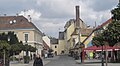 Fußgängerzone und Schornstein der ehemaligen Brauerei