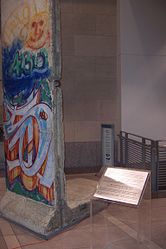 The building houses a segment of the Berlin Wall.