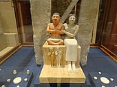 Dwarf Seneb with his wife (2400-2500 BC)