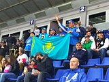 Spectators with the Kazakh flag
