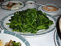 Sautéed snow pea shoots, a popular dish in Chinese cuisine