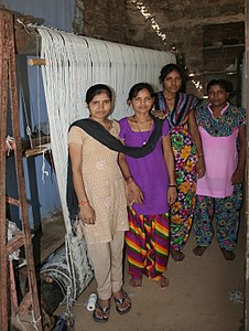 Roller take-up bar on a loom in India, 2014