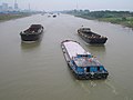 Self-propelled barges on the Grand Canal of China near Yangzhou, Jiangsu, China