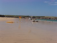 Beach lifeguards and swimming-surfing areas at Harlyn Bay, just north of St Merryn