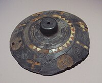 Decorated lid of a large pyxis, similar to those found in Ai-Khanoum, Takht-i Sangin, 3rd-2nd century BC, National Museum of Antiquities of Tajikistan (M 7126)